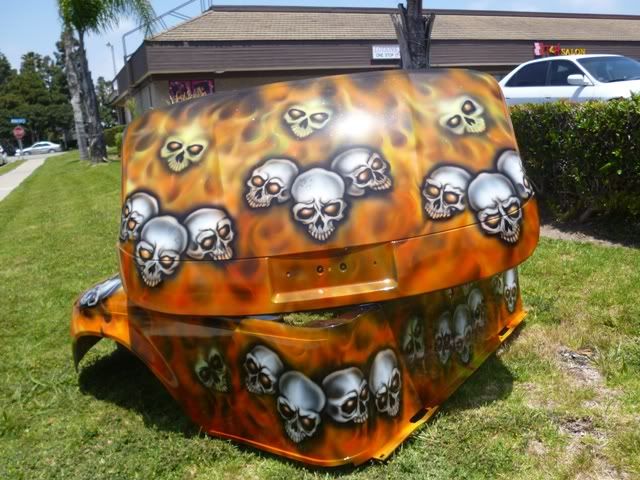 http://i1017.photobucket.com/albums/af294/ecwmesa/skullezgo11.jpg