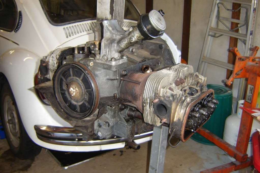 http://i1017.photobucket.com/albums/af296/craig179/Engine%20Pull%20down/enginefinallyonstand.jpg