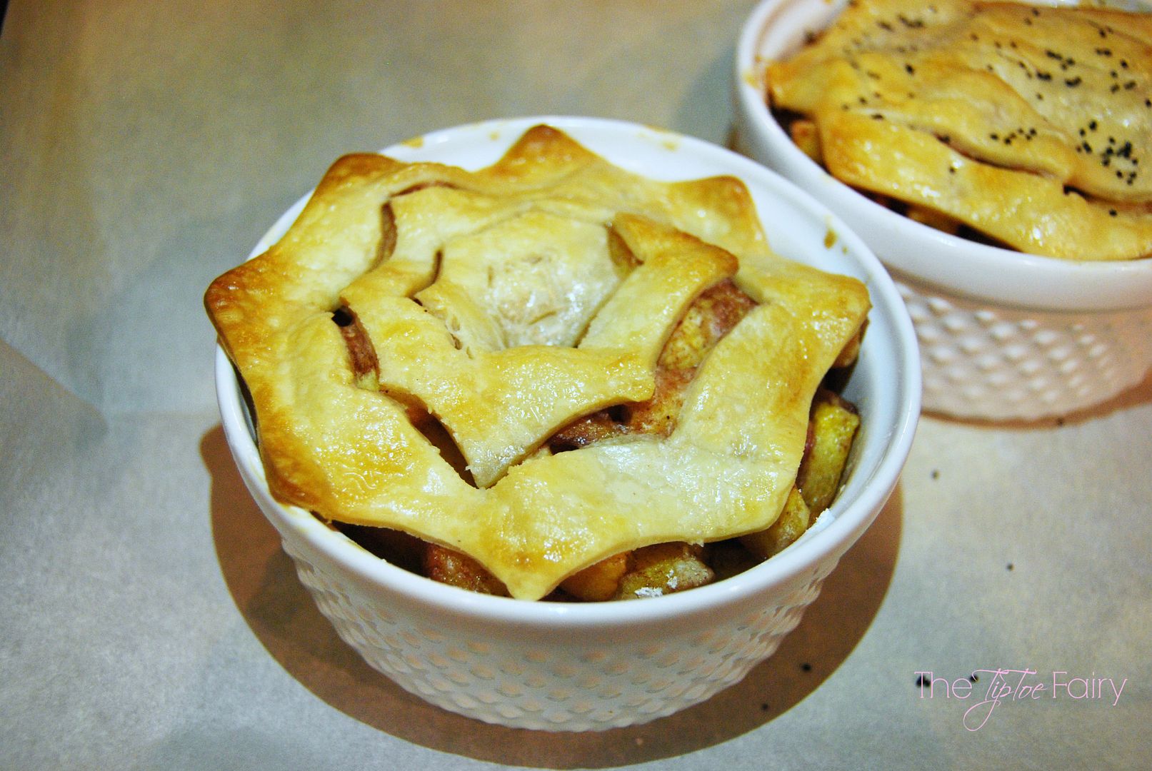 Make Spider Web Mini Peach Cobblers with spider web cookie cutters | The TipToeFairy #halloweentreats #halloweenrecipes #peachrecipes #peachcobbler