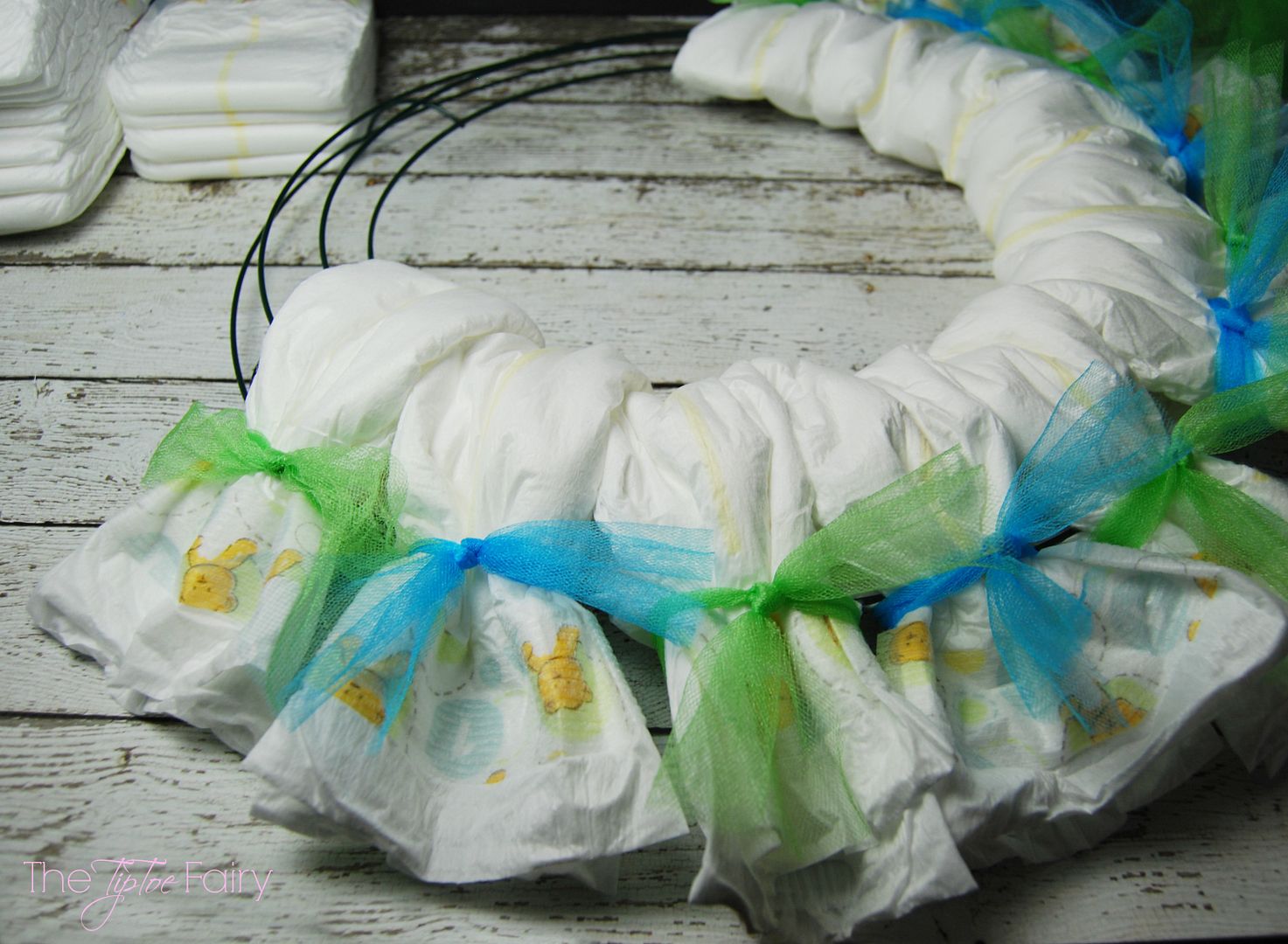 Baby Diapers Wreath Tutorial | The TipToe Fairy #BabyDiapersSavings #CollectiveBias #shop #diaperwreath #babygift #tutorial