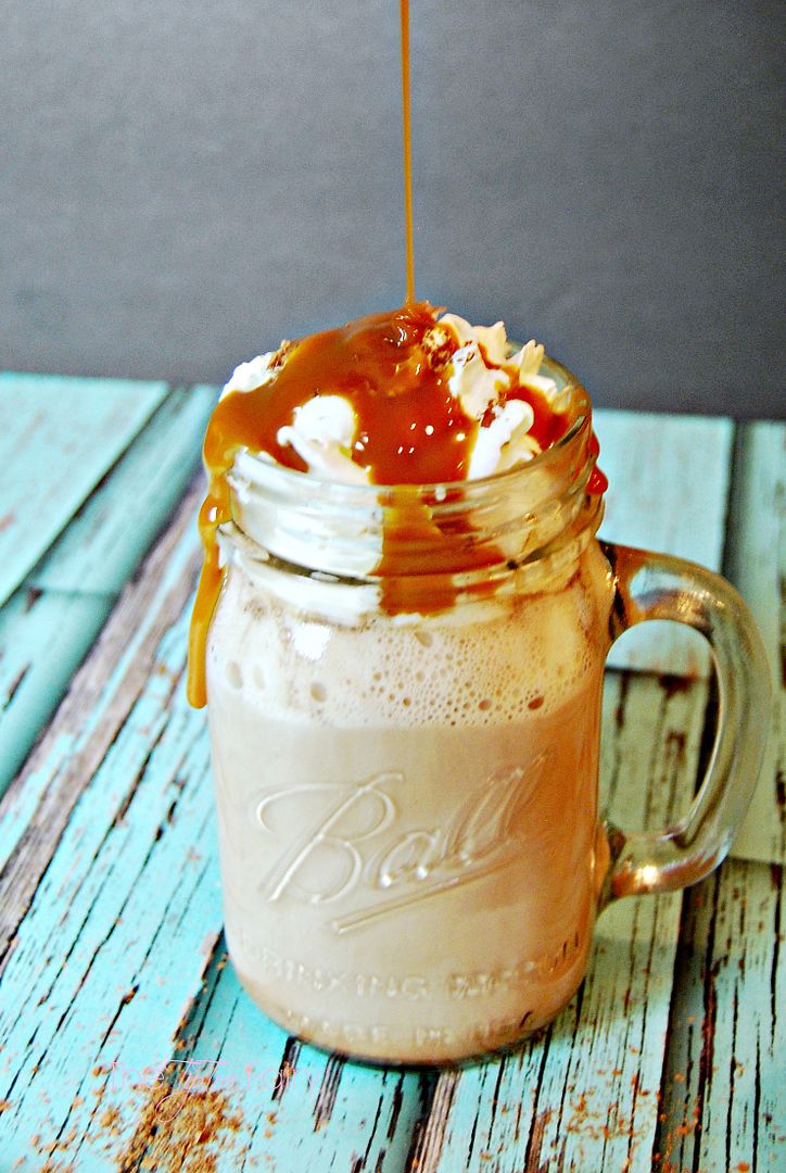 Hot Beverages in the slow cooker.  Slow Cooker Dulce de Leche Hot Chocolate | The TipToe Fairy #slowcookermeals #hotchocolate #drinkrecipes #slowcookerrecipes 