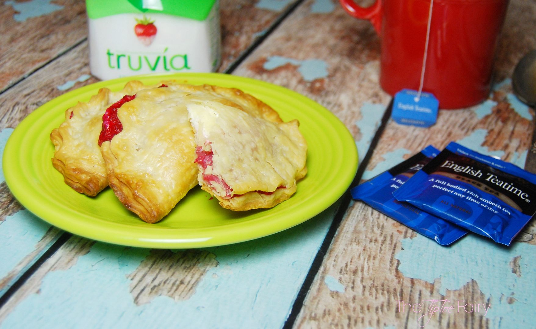 Smashed Raspberry Cream Cheese Hand Pies - a delicious dessert made with Truvia® and perfect with a cup of Bigelow tea | The TipToe Fairy #ad #SweetWarmUp #pierecipe